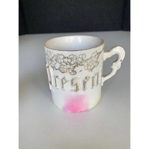 Vintage white “present” cup mug germany.